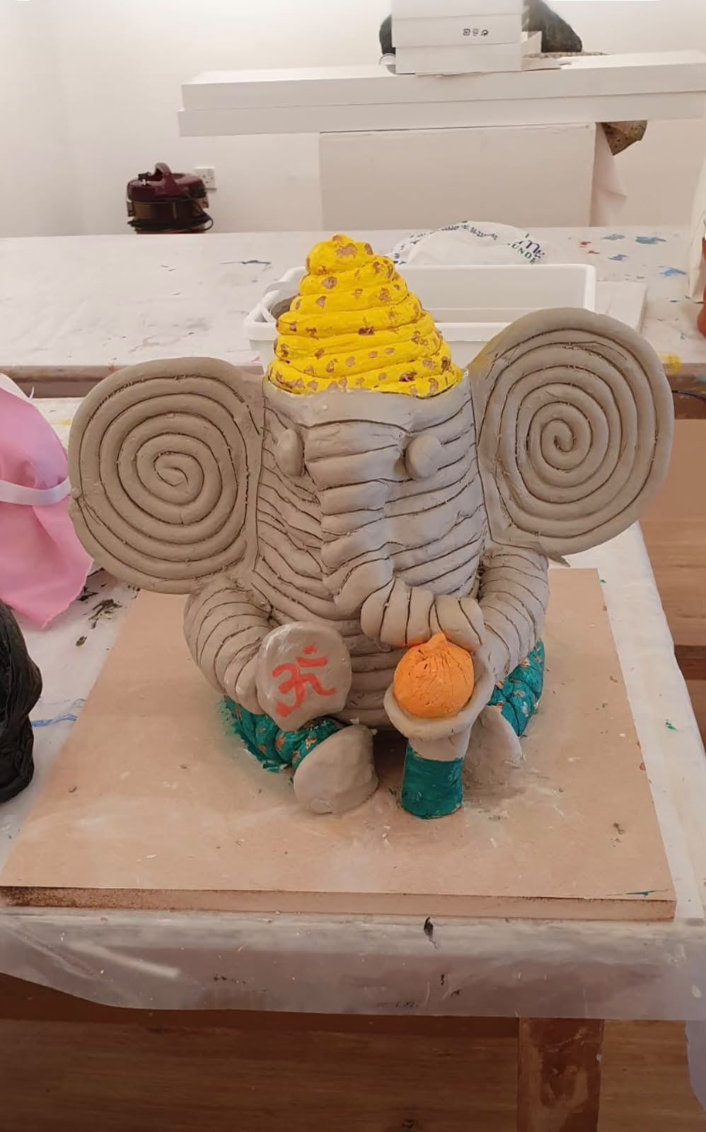 Coiled clay Ganpati figure, third year